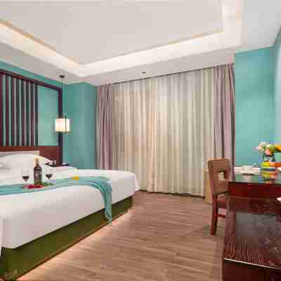 喜悦萬家酒店（武義模具城佳源廣場店） Rooms