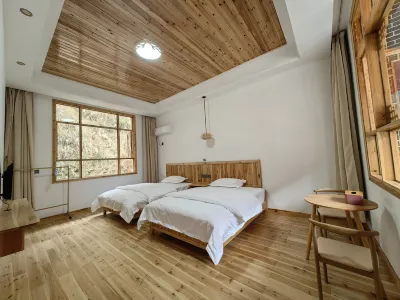 Peach Blossom Garden Green Water Qingshan Homestay Hotel in zona Tao Hua Yuan