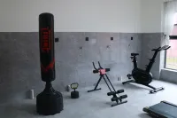 Yihai Muqi Hotel，Mianning - Gym