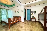 Half Moon Village and Beach House Hotels in Lian