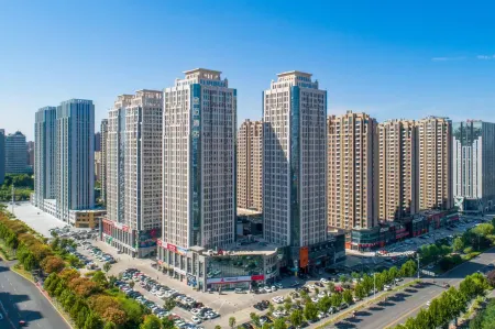 Jinmai Hotel (Xinxiang Municipal Government High-speed Railway East Station) Отели в г. Синьсян