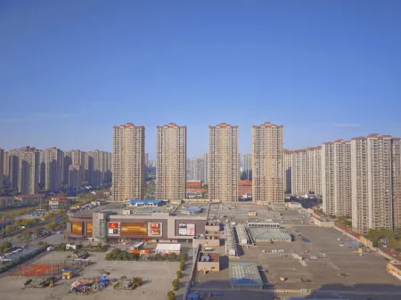 Junlan Li Feng light luxury hotel（Cixi Hangzhou Bay Century City store） Отели рядом с достопримечательностью «Ningbo Engineering College»