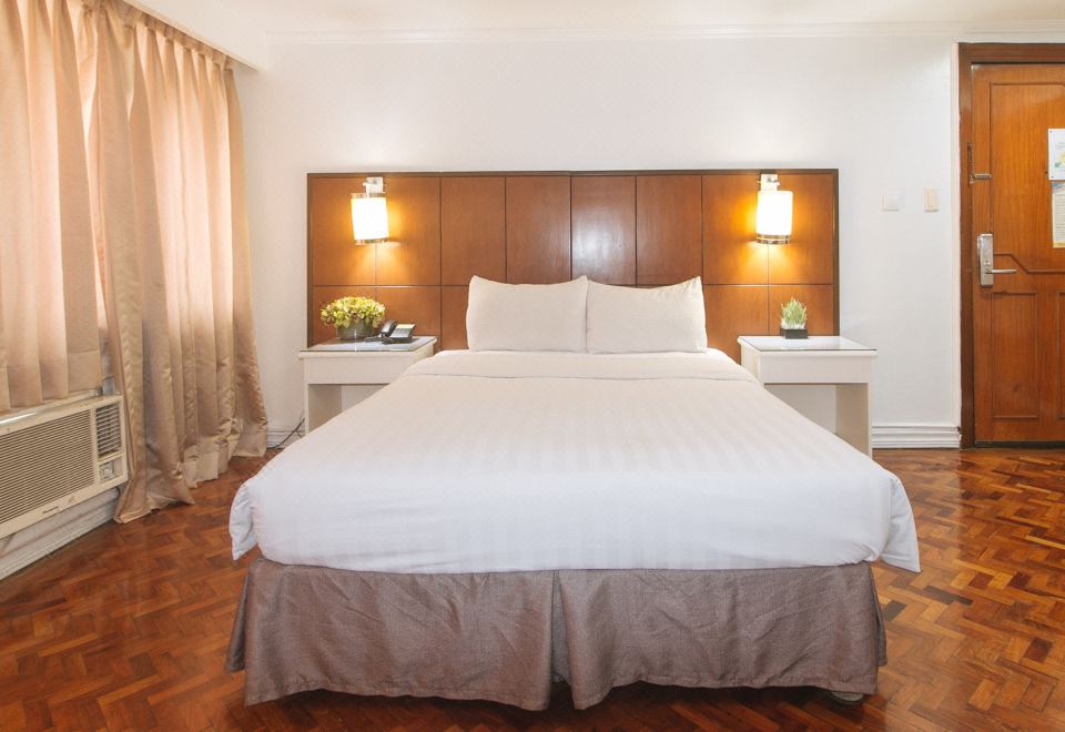 Comfy Inn Manila Kalaw by RedDoorz 이미지