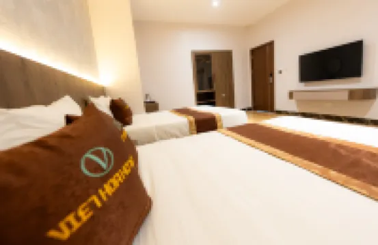 越華酒店及公寓