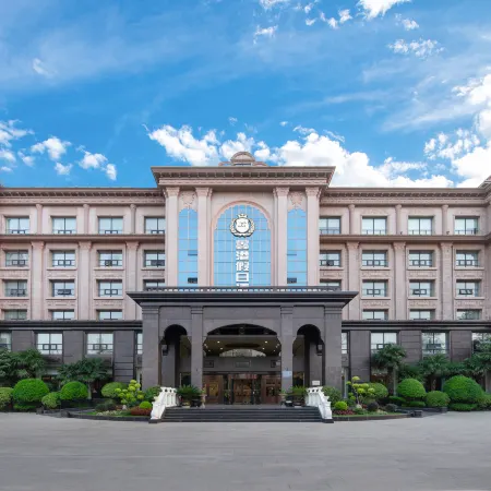 Xingang Holiday Hotel(Xinzheng International Airport Shop) Отели рядом с достопримечательностью «Отель Cai Jianguo - Конференц-зал»
