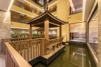 Douzhou Courtyard Hotel (Maoming Xinyi Douzhouli Cultural and Creative Street) Hôtels à : Xinyi