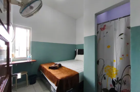 喬伊民宿巨港 酒店