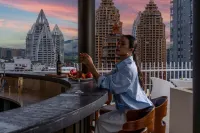 暉廷雲居高空泳池度假酒店（西雙版納景洪告莊西雙景星光夜市店） - 酒吧