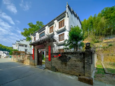 Shanqian Shuxia Hostel Отели рядом с достопримечательностью «Guzhang Folklore Garden»