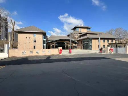 Baogang Hotel Отели рядом с достопримечательностью «A'erding Botanical Garden»