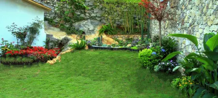 Xingyi Wanfenglin Ruhuazaoye Homestay (Baguatian Observation Deck) Отели рядом с достопримечательностью «Pingdong Square»