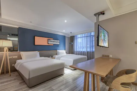 Qifan Hotel (Kunming Railway Station Vientiane City)