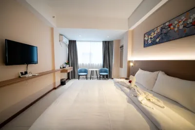 Kana Business Hotel (Zhanjiang Haitian Park Yingzhan Holiday Plaza)
