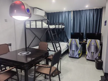 Fengye E-sports Hotel (Xingan Railway Station) Отели рядом с достопримечательностью «Zhu De Commander in Chief Mrs. Xiao Jufang Former Residence»