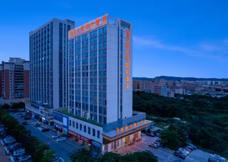 Vienna International Hotel (Dongguan Qingxi Center) Отели рядом с достопримечательностью «Yanhu Park»