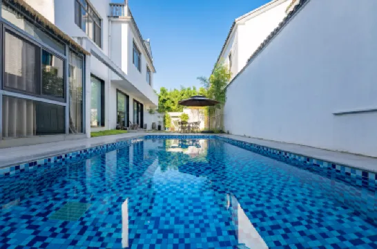 Suzhou Tree and Villa Guesthouse Отели в г. 