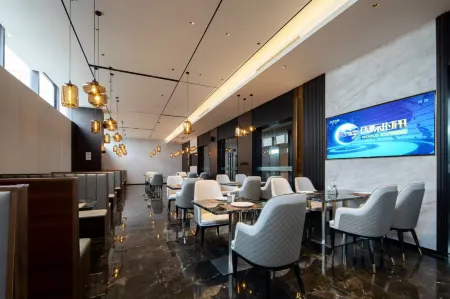 Magnotel Hotel (Jinan Zhangqiuqu Zhengwu Center University Town) Отели рядом с достопримечательностью «Jinan Engineering Vocational and Technical College (Xiuyuanhe Campus)»