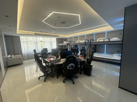 Huo Li Quan Kai E-Sports Hotel Отели рядом с достопримечательностью «Motan Taohua Island»