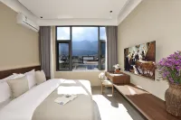 Jiheang Wood Creek Xishuang Traveler's Inn Hotels near Huayu Ranch