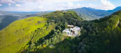 Phoenix Mist Retreat | Dali Wuliang Tea Forest Resort فنادق في نانجيان