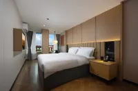 Oriental Dole Enjoyment Hotel (Oriental Culture Square High speed Railway Station Branch) Hotel a Dongfang