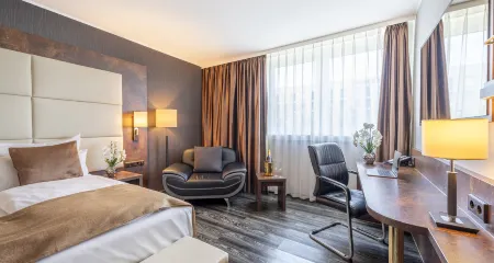 Best Western Plus Plaza Hotel Darmstadt Отели рядом с достопримечательностью «Darmstadtium»