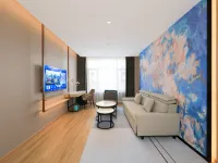 Magnolia Business Hotel (Changbai Mountain West Station Songjiang River Branch) Hotels in Fusong