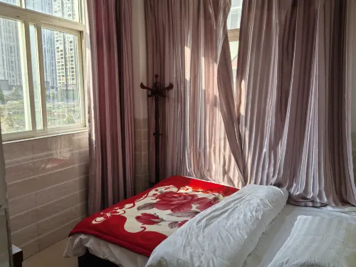 Zhaoyang Dingjue Hotel - Homestays