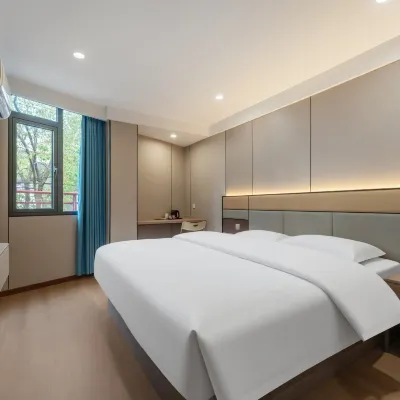 Xinyi Hostel Hotels near Jiangwan Town Station