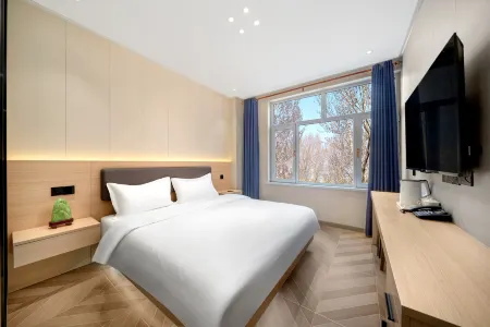 Harbin Mu'an Express Hotel Отели рядом с достопримечательностью «The Open University of Harbin Shuangcheng Branch»