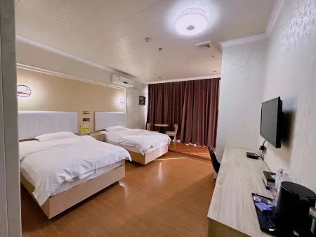 Hua Ji Hotel Отели рядом с достопримечательностью «Golden Rooster Ridge»