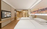 Vienna International Hotel (Yinzhu Metro Station, West Coast, Qingdao) Отели рядом с достопримечательностью «Кунг Наньли Торговый Билдинг»