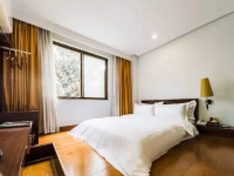 Mingdian Holiday Hotel Hotéis em Shiping