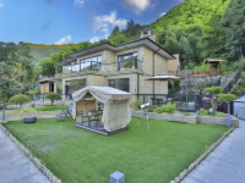 Yushu Yihuanshan Secret Land Suxi Tang Hot Spring Resort Hotel (Anji Shenxi Canyon Drifting Branch) Hotels near Zhebei Grand Canyon