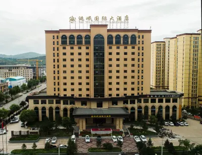 Taomin International Grand Hotel Hotels near Erlangshan Mountain