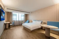 Huating Hotel (Yuanjiang Bus Station Qixiashan Wenquan)