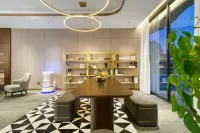 โรงแรมโฮมอินน์ พลัส (รัฐบาลตำบลซูชุน ไห่หนิง เมืองฮังไห่ วานตัว)