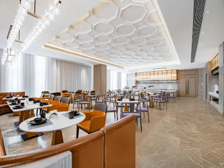 Vienna International Hotel (Taihu Puxian Road) Отели в г. Тайху