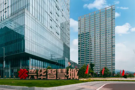 Dongguan Shiguang Cloud International Apartment Отели рядом с достопримечательностью «Guangdong University of Science & Technology»