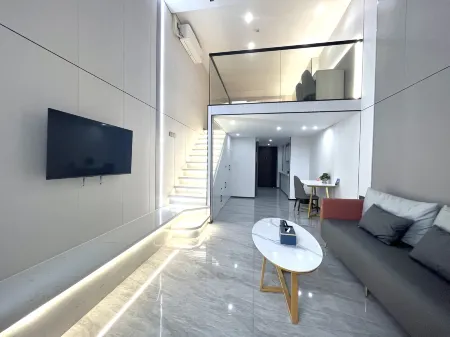 Yijia Apartment (Jiangmen East Station Jianghai Wanda) Отели рядом с достопримечательностью «Celebrity Plaza»