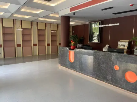 Yunshang Hotel (Wuhan Foxconn Technology Group Store) Отели рядом с достопримечательностью «Hubei University of Economics»