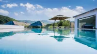 Mayfly Mountain Villa Resort Homestay Hoteles en Fushun