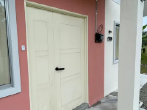 Oryza Panthera Cottage Hotel di Api-Api