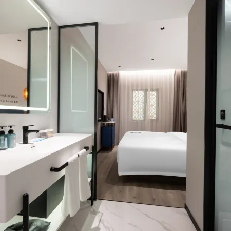 Mannsic Hotel (Beijing Guomao Chaoyang Road Branch) Отели рядом с достопримечательностью «Станция Sihui»