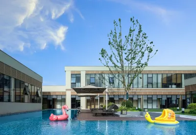 Yangzhou Fengyin wutong Holiday Hotel Hotels near مطار يانغزهو تايزهو