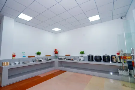 Xinyue Business Hotel Отели рядом с достопримечательностью «Yongchun Tulou»