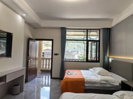 Baima Yueke Boutique Homestay Отели рядом с достопримечательностью «Baimazhai Village»