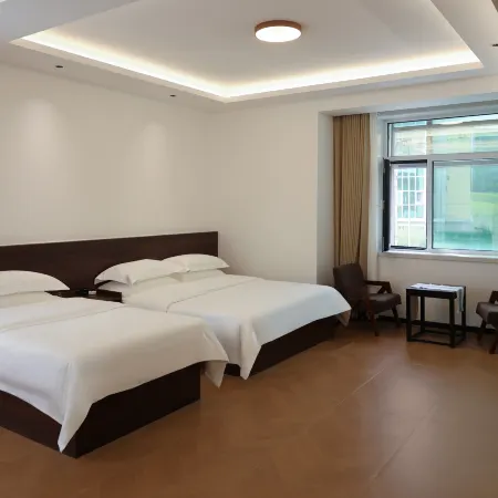 Qimu Homestay Hotel