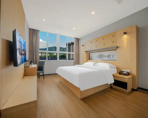 Guangzhou Jiulong Hotel (Xingren Liren Square) Hotels in Xingren