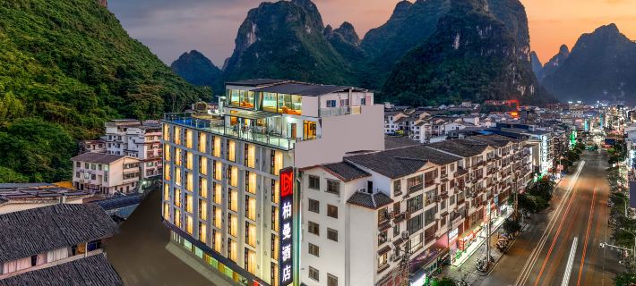 Yangshuo Boman Hotel Отели в г. Яншуо